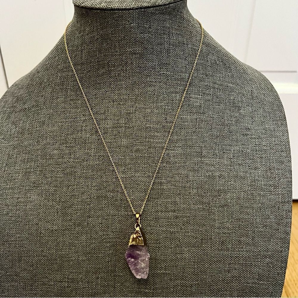 Purple raw crystal (amethyst?) necklace on a gold tone chain